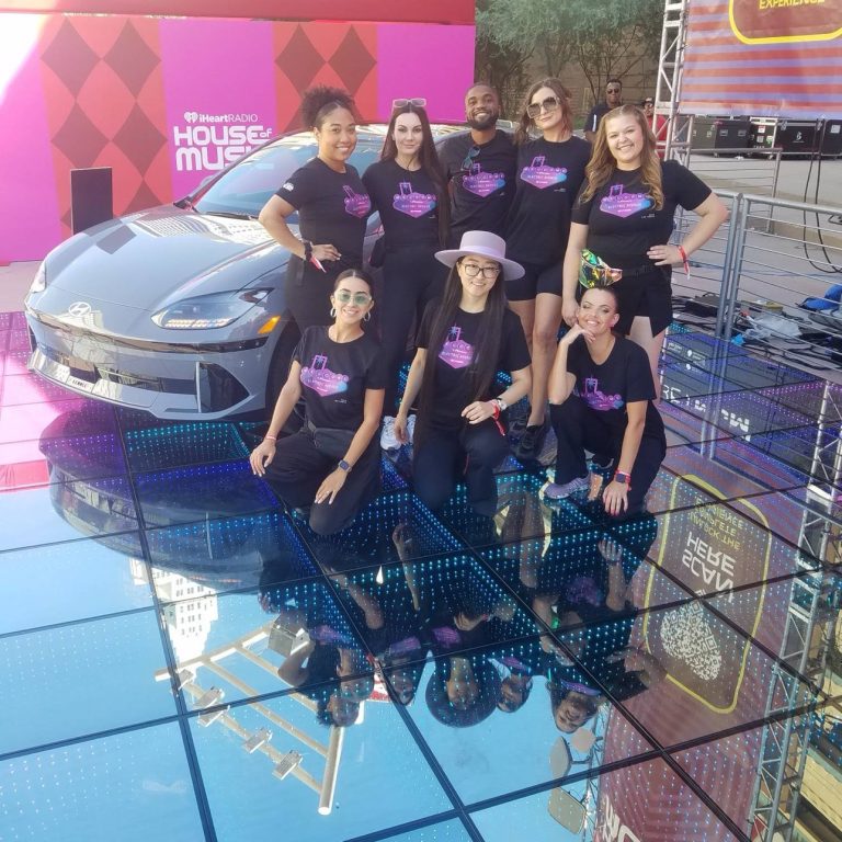 Brand ambassadors repping Hyundai brand activation at music festival.