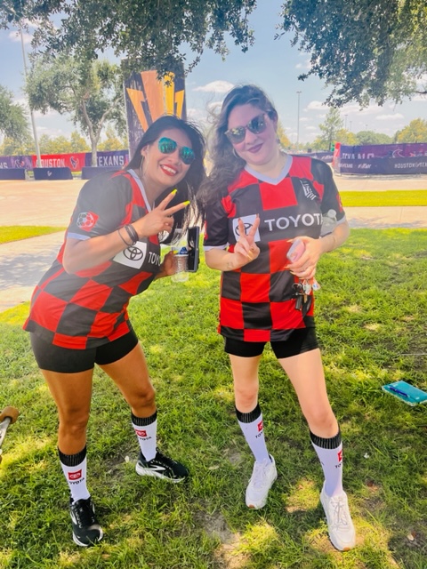 Promotional staff interacting with soccer fans before World Cup match